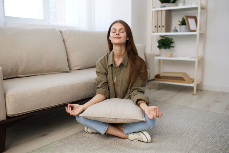 Woman meditating at home.