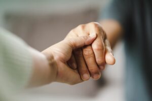 Holding hands showing gratitude