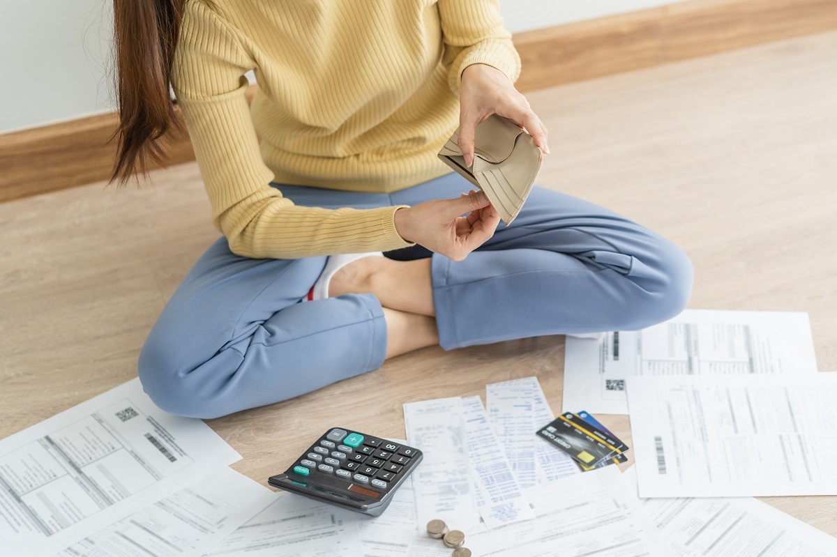 Woman reviewing financial documents.