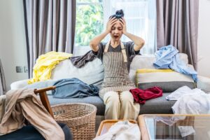 Woman stressed by clutter