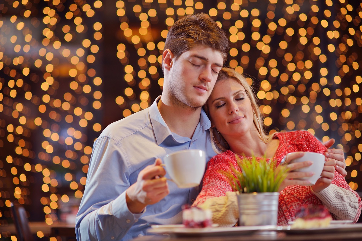 Couple relaxing with coffee.