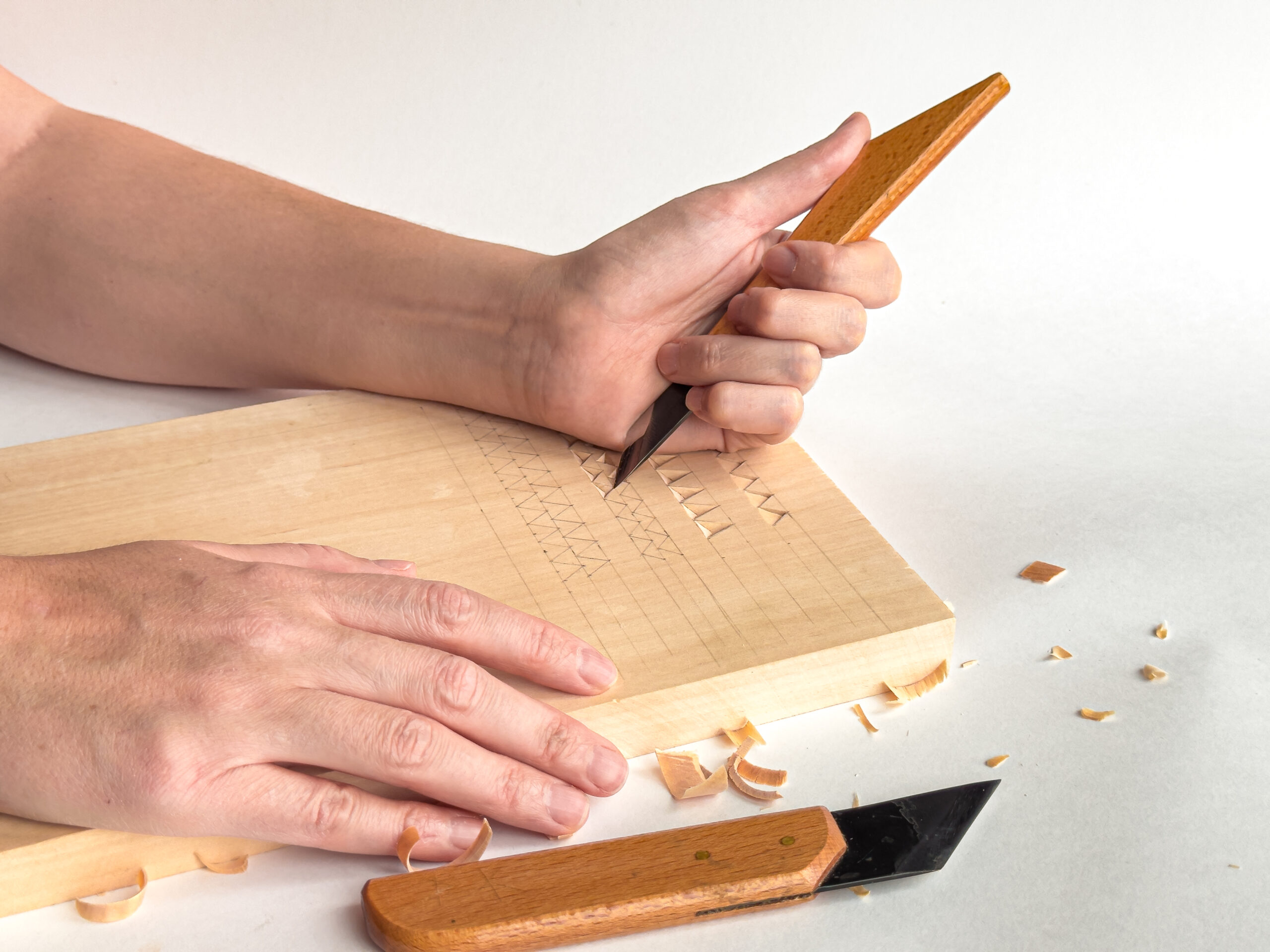 Wood carving hands close-up