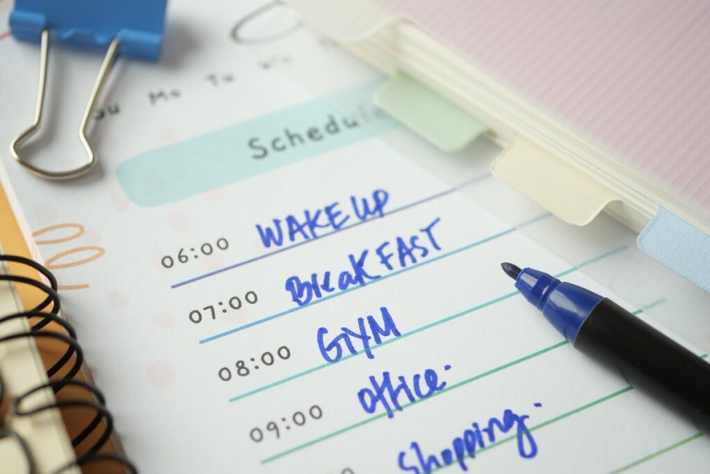 Daily routine schedule with blue pen