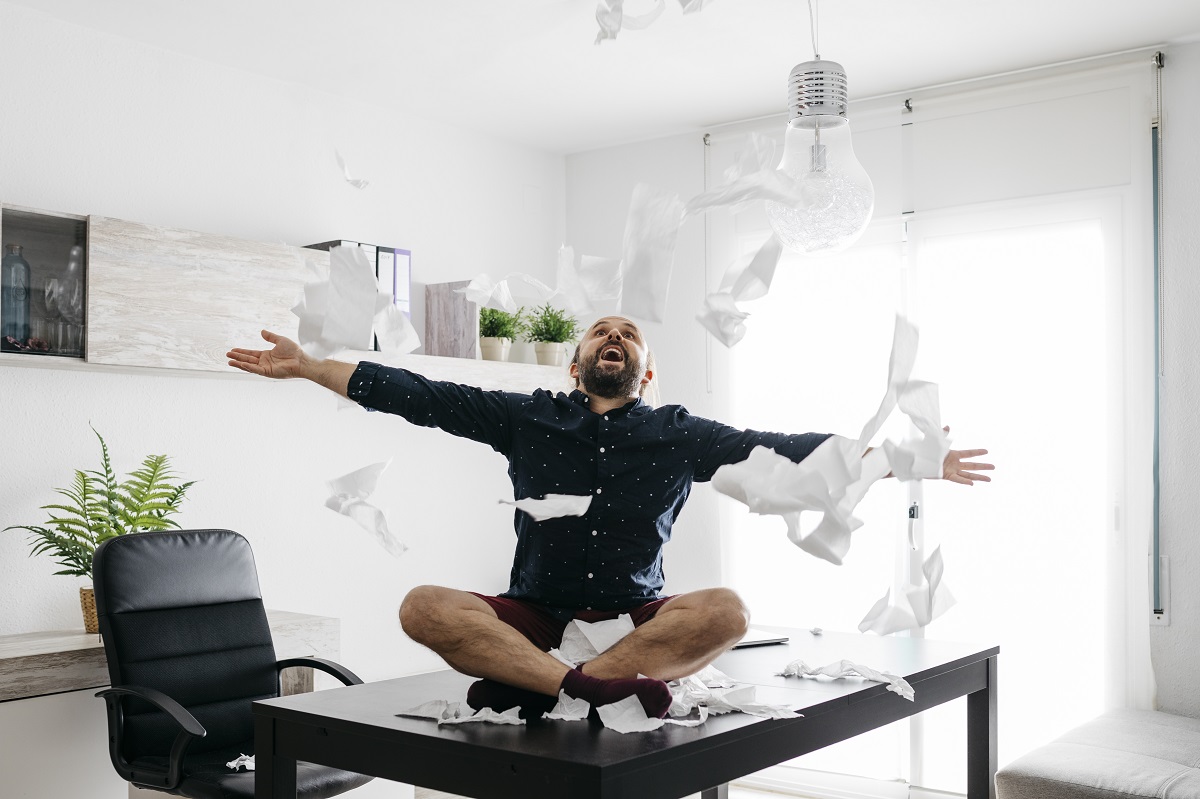 Man relaxing and letting go of stress.