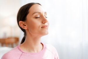 Woman practicing mindful breathing