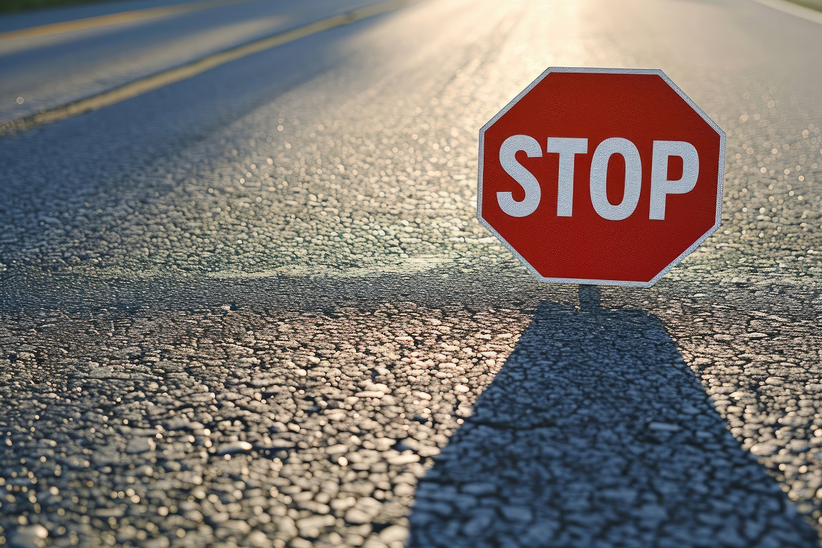 Stop sign on empty road